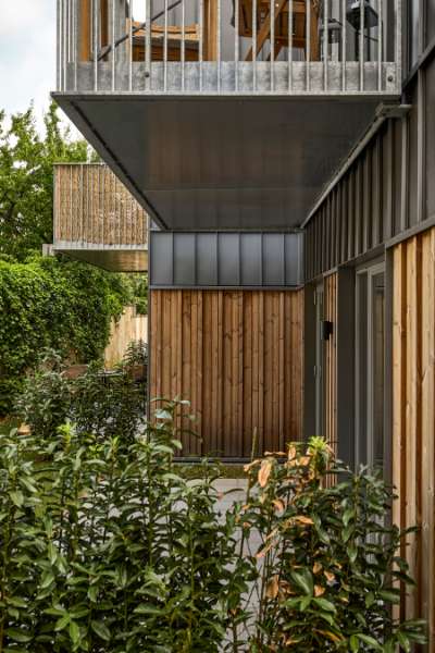 Steel profiles and wood united on the façade of modern homes in Aalborg, Badehusvej 1, 9000 Aalborg